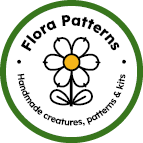 Flora Pattern circular logo in green with a white central daisy.